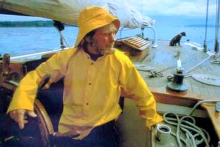 David
        Baxter sailing the Lieber Schwan with his trusty little boat-nik
        CoCo.